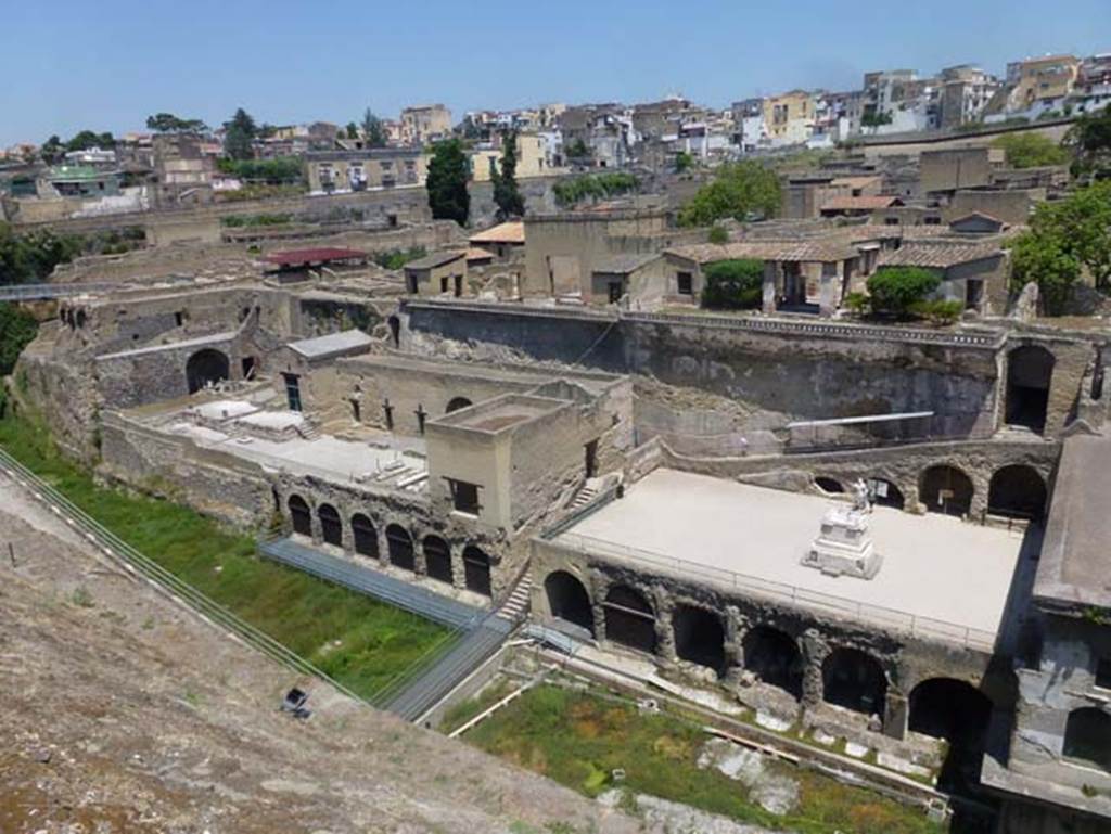 Herculaneum, June 2012. Looking north-west to lower level and arches of the boatsheds below the Sacred Area, on left, and Terrace of Balbus, on right. Photo courtesy of Michael Binns.